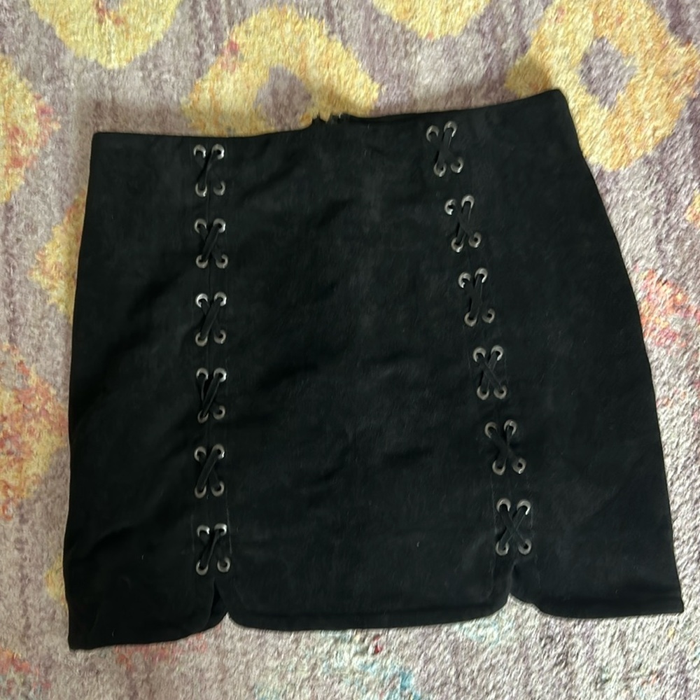 Black velvet skirt with embellishments